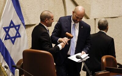 The new speaker of the Knesset, Amir Ohana, receives his gavel as Israel's new right-wing government is sworn in at a special session of the Knesset in Jerusalem on Thursday, December 29, 2022. Netanyahu became the Prime Minister of Israel for the third time. Pool Photo by Amir Cohen/ Credit: UPI/Alamy Live News