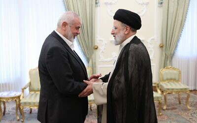 Iranian president Ebrahim Raisi, who died in a helicopter crash earlier this year, meets with Ismail Haniyeh in Tehran on March 27 2024.