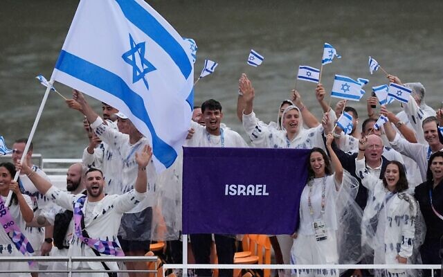 The boat carrying team Israel makes its way down the Seine in Paris, France, during the opening ceremony of the 2024 Summer Olympics, Friday, July 26, 2024.(AP Photo/Rebecca Blackwell)