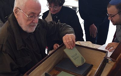 Bob Rubin with his sister's suitcase