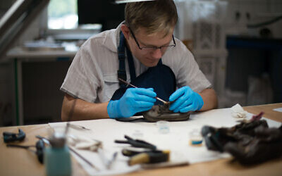 Consolidation of leather. Pic: The Auschwitz Memorial