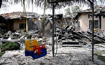 Children's swing among rubble after a house in Israel is struck by a Hamas terror rocket