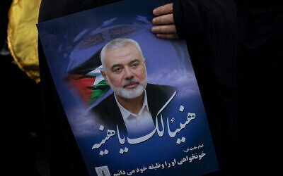 Iranians take part in a protest against the killing of Ismail Haniyeh, the political head of Hamas, in Palestine Square in Tehran, Wednesday, July 31, 2024. (Majid Saeedi/Getty Images via JTA)