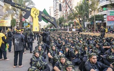 Hezbollah members observing Ashura as Hassan Nasrallah speaks publicly. Credit:  Stephen Gerard Kelly/ZUMA Wire/Alamy Live News