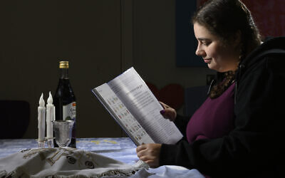 Jess who Kisharon supports looks forward to using the new Siddur Lakol on Friday night Photo credit Robert Shack