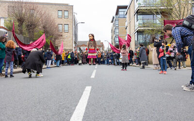 Little-Amal-Parting-the-Red-Sea-on-Lymington-Road_Godson-Studio.