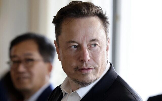 Elon Musk looks at a business summit at the Chateau de Versailles, outside Paris, May 15, 2023. (Ludovic Marin/Pool/AFP via Getty Images)