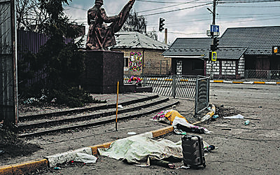 The dead bodies of people killed by Russian shelling in the town of Irpin, Ukraine. (AP Photo/Diego Herrera Carcedo)