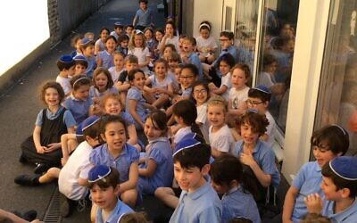 Year 2 pupils at Sacks Morasha in the school playground