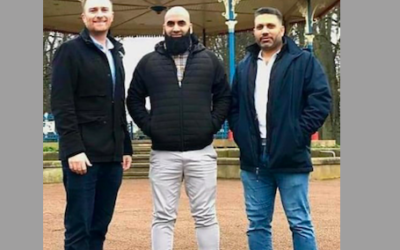 Shakeel Hussain, far right, next to another local election candidate, and the local Stockton MP Matt Vickers, left